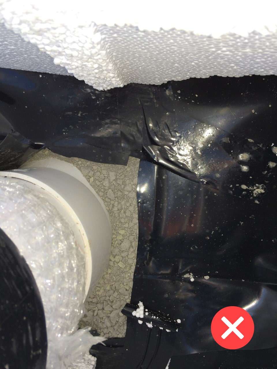 D.P.M. cut too short showing the GAP - Poor installation of membranes around service ducts.