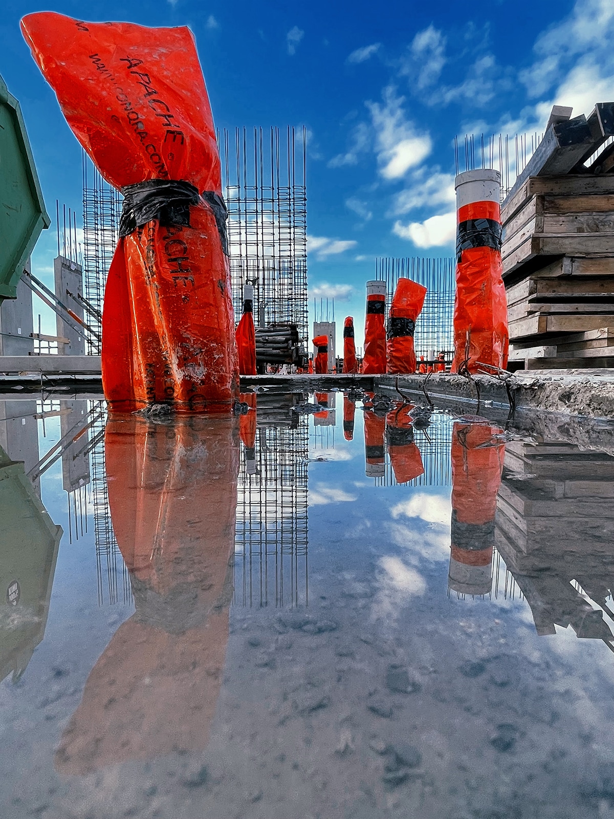 Apache plumbing sleeves at a commercial construction site - Why did we pick SAFETY ORAGE as the colour of our Apache plumbing sleeves?