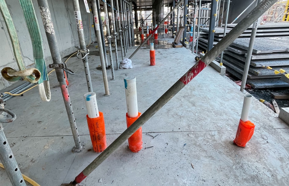 Apache plumbing sleeves at a commercial construction site 4 - Why did we pick SAFETY ORAGE as the colour of our Apache plumbing sleeves?